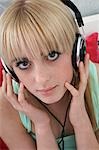 Portrait of teenage girl (16-17) with headphones