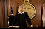 Female judge standing in court, portrait