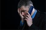 Worried Businessman on the Telephone