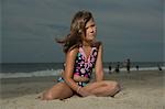 Little Girl Sitting on a Beach