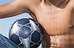 Mans torso with soccer ball