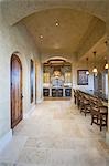 Tiled floor of palm Spring kitchen with arched ceiling