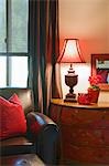 leather sofa with lit lamp in Palm Springs home interior