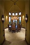 Chandelier hangs over table in Palm Springs dining room