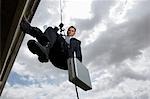 Spy Rappelling with Suitcase
