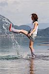 Woman Splashing in Water,  Fuschlsee, Salzburg, Austria