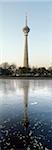 China,Beijing. The CCTV (China Central Television) tower reflected in the river at Yuyuantan Park.