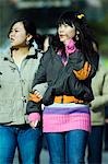 China,Beijing. Chinese girls walking on Wanfujing Shopping street.