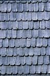 Wooden shingles on side of farm building