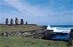 The ceremonial centre of Tahai showing the ancient stone canoe slipways and the platform of Ahu Vai Uri with its four squat moais and the stump of a fifth. Tahai is just a short walk from Easter Island's main settlement,Hanga Roa on the west coast of the island,backed by the Pacific Ocean.