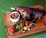 A main course of roast lamb and fresh vegetables served at the Explora Hotel in the Atacama Desert
