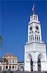 Torre Reloj,a tall white clocktower in the central square,Plaza Prat,has been adopted as Iquique's symbol. Situated on the coast at the foot of the 800-metre coastal cordillera,Iquique is the capital of Region 1. During the nitrate boom in the 19th century Iquique became Chile's richest city.