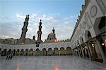 A group of young Egyptians walks across the courtyard of the Al Azhar mosque after Friday prayers.