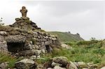 A ruined chapel looks out over the sea at Cape Cornwall near St Just on Cornwall's north coast,England