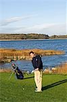 UK,Northern Ireland,Fermanagh. Playing golf on the new course designed by Nick Faldo at Lough Erne Golf Resort .
