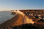 England,East Sussex,Beachy Head. Beachy Head is a chalk headland on the south coast of England,close to the town of Eastbourne. The cliff there is the highest chalk sea cliff in Britain,rising to 162 m (530 ft) above sea level. The peak allows views of the south east coast from Dungeness to the east,to Selsey Bill in the west.