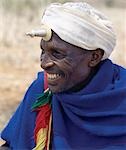 A Borana man at Mega in southern Ethiopia wears a phallic Kallaacha on his forehead. Made of cast aluminium and ivory or bone,the Kallaacha is worn during the tribe's initiation and gada age-grade ceremonies. The pastoral Borana live either side of the southern Ethiopian/northern Kenya border and form a large and important group of the Oromo-speaking cluster of tribes.