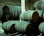 Wine barrels in an underground cellar at Bodega Real Divisa winery in the village of Abalos. This is one of the oldest wineries in Spain dating back to the 14th Century.