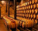 Barrels of Rioja wine in the underground cellars at Muga winery