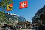 The Swiss and Regional Flag flies over the village of Interlaken,Jungfrau Region,Switzerland