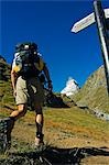 A Matterhorn (4477m) hiker at the trail junction,Zermatt,Valais,Switzerland