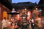 Longshan Temple worshippers and incense burners