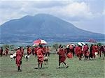 A Colourful Maasai livestock market near the towering extinct volcano of Kerimasi.