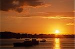 Wexford Harbour, County Wexford, Ireland; Sunset over boats in harbour