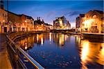 River Garavogue, Sligo, Co Sligo, Ireland;  Town along a river at night