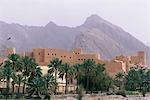 Nakhl Fort stands in the foothills of the Western Hajar Mountains. The early foundations are thought to pre-date Islam. The mainly 17th century fortress visible today stands over 30 metres high and covers 3,400 square metres.