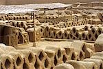 The well preserved adobe ruins of the Tschudi Royal Compound in the Chimu site of Chan Chan in northern Peru. Built around 1300 AD and covering 28 square km,Chan Chan is the largest pre-columbian city in the Americas and largest adobe settlement in the world.