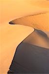 Wind blown curves in the desert sands,near Ica in southern Peru