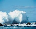 Waves crashing on rocks at coast