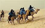 The Festival in the Desert 2005. Touregs arriving by camel to the festival