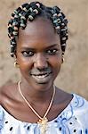 Mali,Gao,Hombori. A young Songhay girl at Hombori with a fetching modern hairstyle.