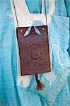 Mali,Timbuktu. A beautifully decorated leather purse hangs round the neck of a Tuareg man.