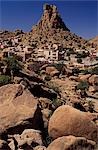 Morocco,Anti-Atlas Mountains,Tafraoute,Aguard Oudad. The so-called Chapeau de Napoleon,or Napoleon's Hat,rock formation overlooks the Berber village of Aguard Oudad on the fringes of Tafraoute.