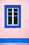 A window in the recently restored schoolhouse on Ibo Island,part of the Quirimbas Archipelago,Mozambique