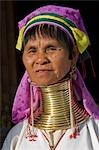 Myanmar,Burma,Lake Inle. Padaung woman belonging to the Karen sub-tribe wearing a traditional heavy brass necklace with twenty-five rings which elongates the neck.