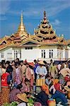 Myanmar,Burma,Lake Inle. Myanmar,Burma,Lake Inle. The popular Phaung Daw Oo market where all kinds of farm produce are sold. The Buddhist pagoda of the same name graces the background.