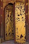 Myanmar,Burma,Wan-seeing. The ornately carved and gilded doors of the beautiful 15th or 16th century Wan-seeing monastery.