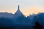 Myanmar,Burma,Mrauk U. Dawn mist shrouds the ancient temples,payas and stupas of Mrauk U.