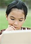 Girl using laptop computer