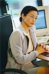 Businesswoman sitting at desk