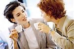 Two businesswomen having coffee