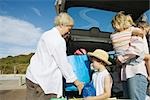 Family unloading car