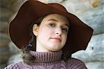 Teenage girl wearing turtleneck and hat, portrait