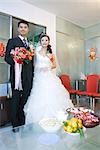Chinese wedding, bride and groom, full length portrait