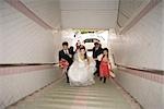 Wedding procession walking up stairs, high angle view