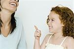 Little girl and mother, laughing